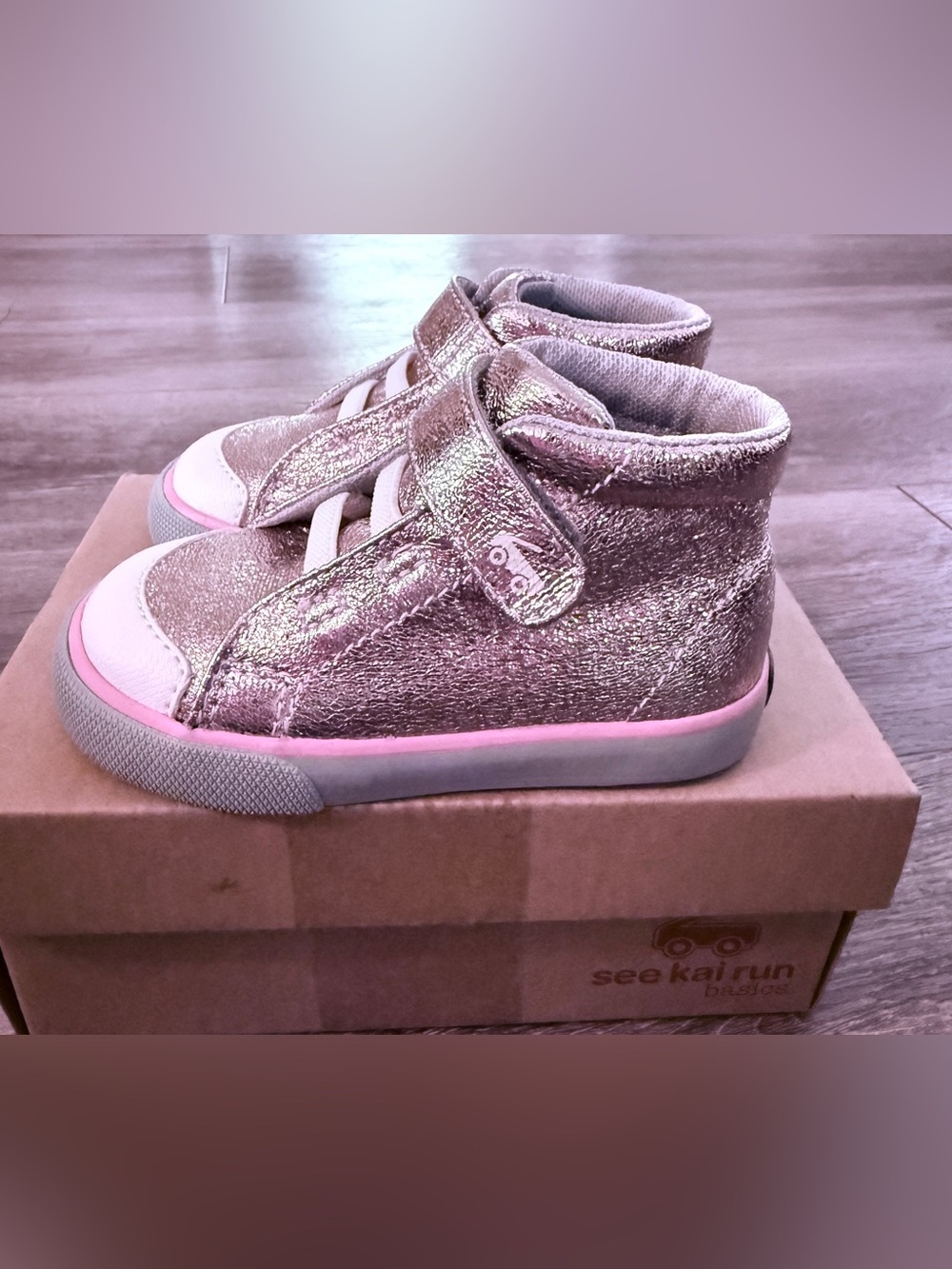 See Kai Run Drew high-top sneakers in a shimmering rose gold finish